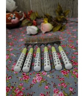 کارد و چنگال دسته سرامیکی طرح گل بنفش کارد و چنگال دسته سرامیکی طرح گل بنفش