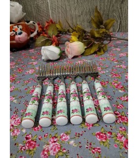 کارد و چنگال دسته سرامیکی طرح گل قرمز کارد و چنگال دسته سرامیکی طرح گل قرمز